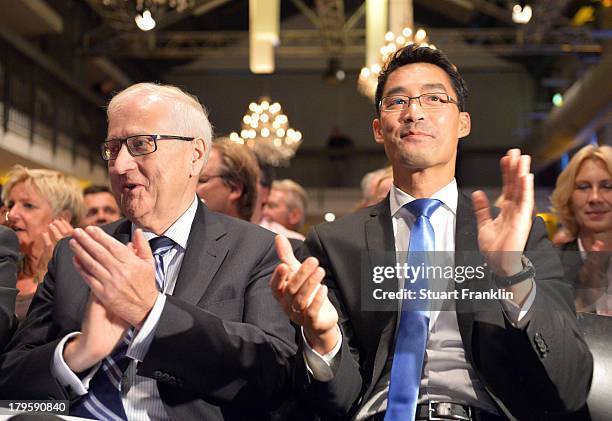 Rainer Bruederle, lead candidate of the German Free Democrats political party and Philipp Roesler, Chairman of the German Free Democrats political...