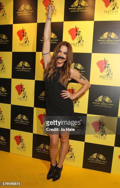 Melanie Chisolm wears moustache and attends the Freddie for a Day charity event in aid of The Mercury Phoenix Trust at The Savoy Hotel on September...