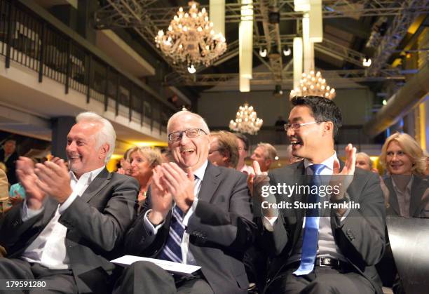 Wolfgang Kubicki, lead candidate in the Schleswig holstein of the German free Demorcrats political party, Rainer Bruederle, lead candidate of the...