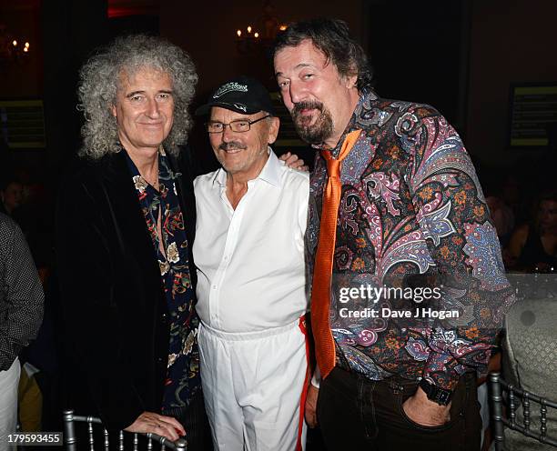 Brian May, Jim Beach and Stephen Fry attend The Mercury Phoenix Trust Queens Aids Benefit at One Mayfair on September 5, 2013 in London, England.