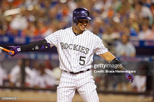 National League All-Star Carlos Gonzalez smiles during the 84th MLB All-Star Game on July 16, 2013 at Citi Field in the Flushing neighborhood of the...