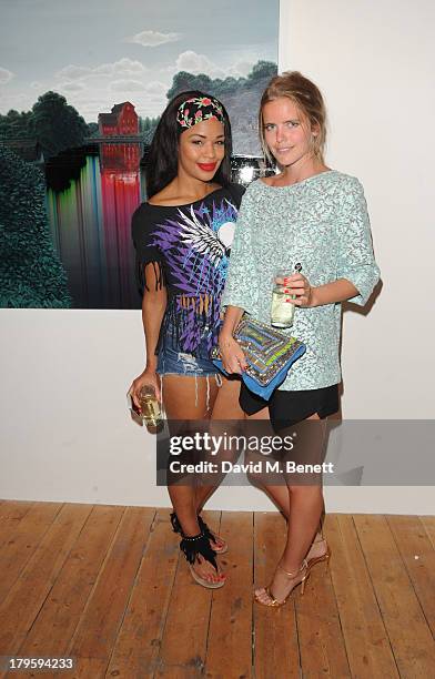 Sarah Jane Crawford and Katie Redman attends the VIP launch of the 'Hand To Earth' exhibition hosted by Matthew Williamson at Scream Gallery on...