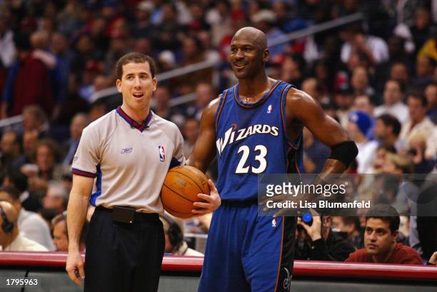 Michael Jordan of the Washington Wizards talks with referee Tim Donaghy during the game against the Los Angeles Clippers on February 12, 2003 at...