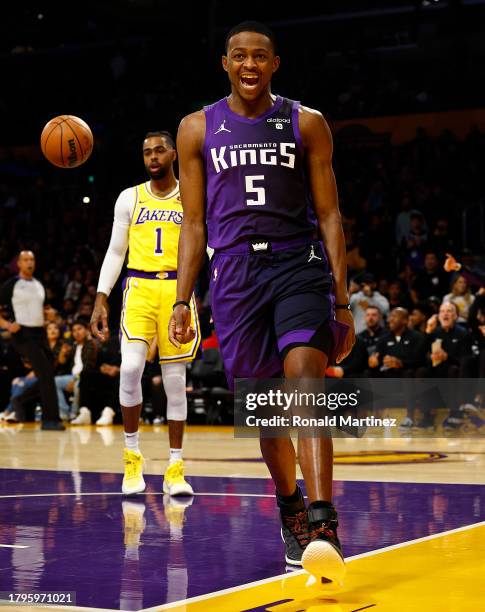 De'Aaron Fox of the Sacramento Kings after fouled by D'Angelo Russell of the Los Angeles Lakersin the first quarter at Crypto.com Arena on November...