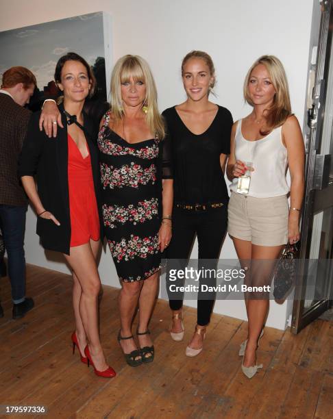 Leah Wood, Jo Wood: Beth Witson and Jodie Wood attends the VIP launch of the 'Hand To Earth' exhibition hosted by Matthew Williamson at Scream...
