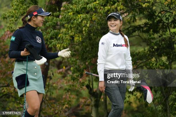 Rei Matsuda and Akira Yamaji of Japan share a laugh on the 5th hole during the second round of Kyoto Ladies Open at Joyo Country Club on November 16,...