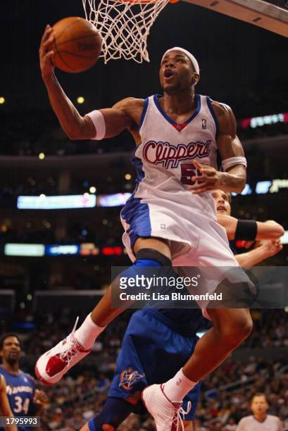 Corey Maggette of the Los Angeles Clippers puts a shot up against the Washington Wizards during the game on February 12, 2003 at Staples Center in...