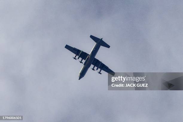 This picture taken from southern Israel near the border with the Gaza Strip shows an Israeli "Samson" plane, the new generation C-130J Super...