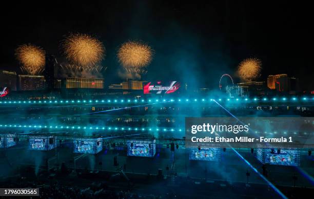 Fireworks explode from Las Vegas Strip properties as John Legend performs during the opening ceremony during previews ahead of the F1 Grand Prix of...