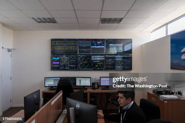 Satellite monitoring screens are displayed at the Bolivian Space Agency Amachuma Ground Station in Achocalla, La Paz Department, Bolivia, on Tuesday,...