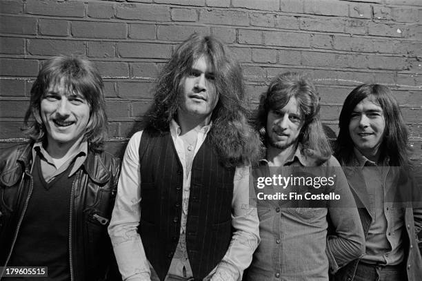 Dave Holland, Glenn Hughes, Pete MacKie and Mel Galley from English rock group Trapeze posed in London in 1973.