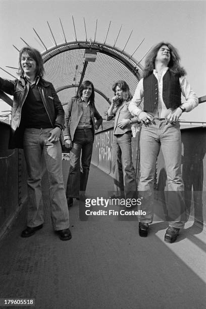 Dave Holland, Mel Galley , Pete MacKie and Glenn Hughes from English rock group Trapeze posed in London in 1973.