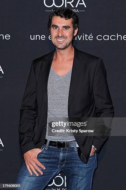 Thomas Joubert attends the photocall for 'OORA' Womenswear Collection designed by French singer Matt Pokora at Pavillon Gabriel on September 5, 2013...