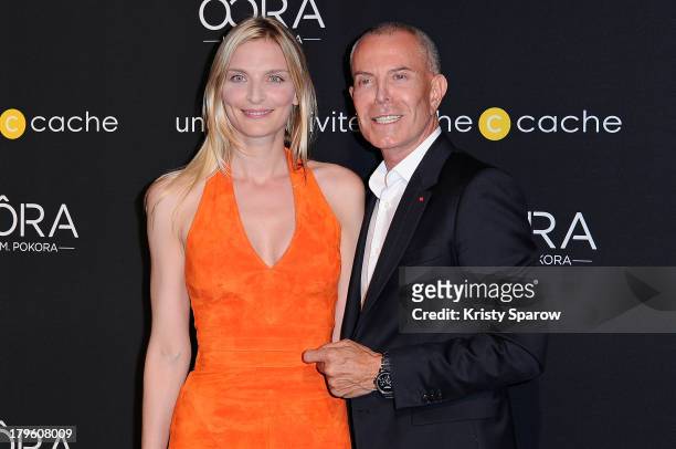 Sarah Marshall and Jean Claud Jitrois attend the photocall for 'OORA' Womenswear Collection designed by French singer Matt Pokora at Pavillon Gabriel...