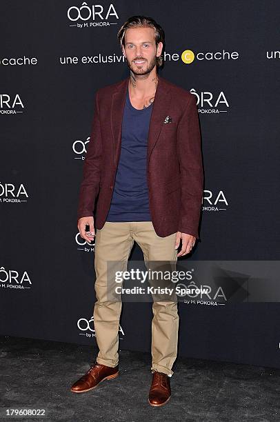 Matt Pokora attends the photocall for 'OORA' Womenswear Collection designed by French singer Matt Pokora at Pavillon Gabriel on September 5, 2013 in...