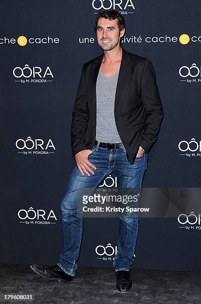 Thomas Joubert attends the photocall for 'OORA' Womenswear Collection designed by French singer Matt Pokora at Pavillon Gabriel on September 5, 2013...