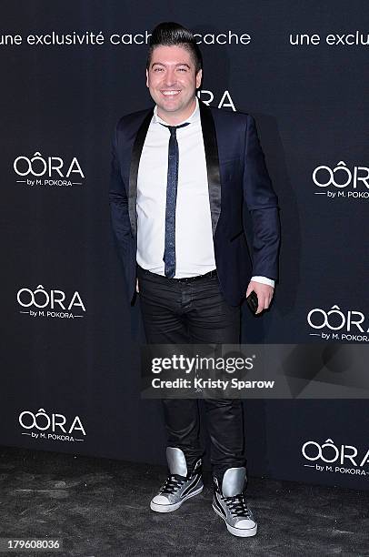 Chris Marquez attends the photocall for 'OORA' Womenswear Collection designed by French singer Matt Pokora at Pavillon Gabriel on September 5, 2013...