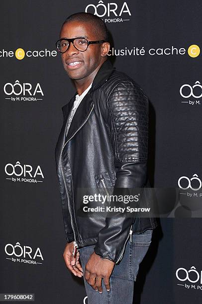 Rio Mavuba attends the photocall for 'OORA' Womenswear Collection designed by French singer Matt Pokora at Pavillon Gabriel on September 5, 2013 in...