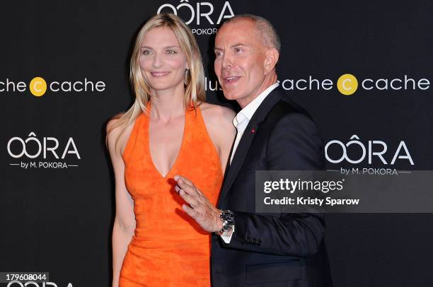 Sarah Marshall and Jean Claud Jitrois attend the photocall for 'OORA' Womenswear Collection designed by French singer Matt Pokora at Pavillon Gabriel...