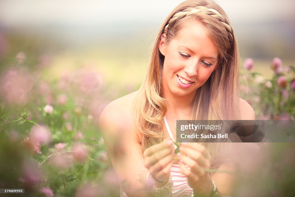 Blonde Woman in Pink Clover Field