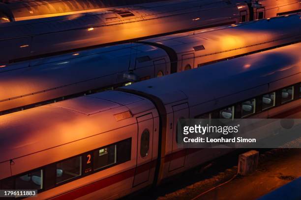 High-speed trains of German state rail carrier Deutsche Bahn stand parked during a nationwide railway strike on November 16, 2023 in Munich, Germany....