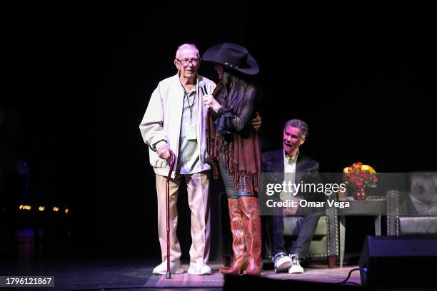 Billy Blythe and Mary Travis speak during A Texas Heroes & Friends Tribute to Randy Travis - 1 Night, 1 Place, 1 Time at Texas Trust CU Theatre on...
