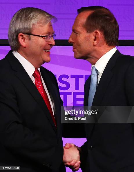 Minister Kevin Rudd Prime Minister Kevin Rudd and Opposition Leader Tony Abbott shake ...