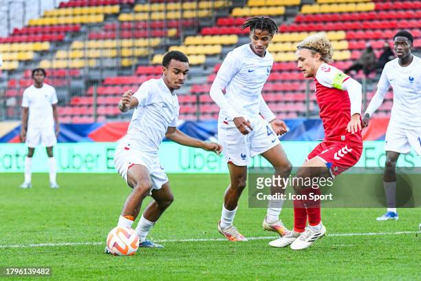 Eli Junior KROUPI of France, Yoni GOMIS of France and Julius BECK of Denmark during the UEFA Euro 2024, qualifications match between France U19 and...