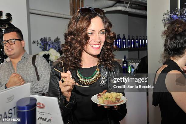 Actress Natalie Brown enjoys a plate of Barilla pasta prepared by Il Fornello's chef Ryan Kowalyk W Magazine Portrait Studio at the NKPR IT Lounge -...