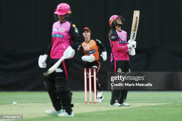 Chloe Tryon of the Sixers reacts after being dismissed by Piepa Cleary of the Scorchers during the WBBL match between Sydney Sixers and Perth...