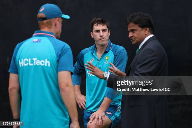 Match Referee Javagal Srinath speaks to Pat Cummins of Australia and Andrew McDonald, Head Coach of Australia prior to the ICC Men's Cricket World...