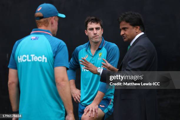 Match Referee Javagal Srinath speaks to Pat Cummins of Australia and Andrew McDonald, Head Coach of Australia prior to the ICC Men's Cricket World...