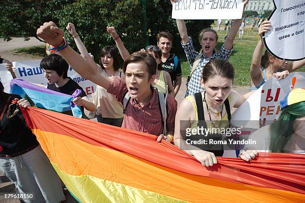Activists demonstrate during the Gay Pride rally in St. Petersburg, Russia, June 29, 2013. Demonstrating LGBT activists and the Russian nationalists...