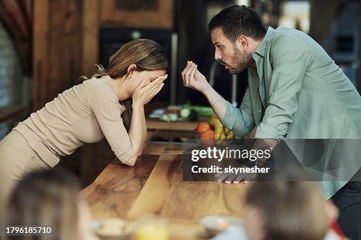 Young couple having an argument at home. Young couple having an argument at home.