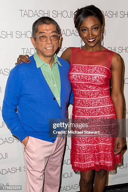 Designer Tadashi Shoji and actress Patina Miller attend the Tadashi Shoji show during Spring 2014 Mercedes-Benz Fashion Week at The Stage at Lincoln...