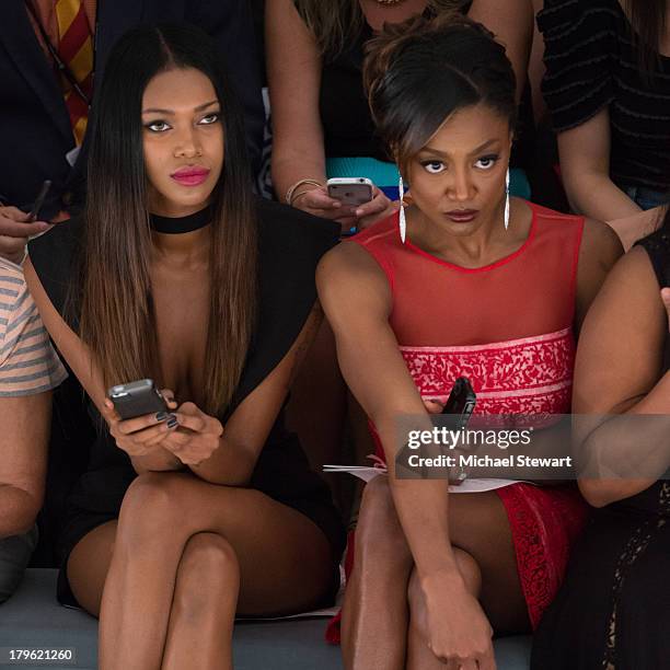Model Jessica White and actress Patina Miller attend the Tadashi Shoji show during Spring 2014 Mercedes-Benz Fashion Week at The Stage at Lincoln...