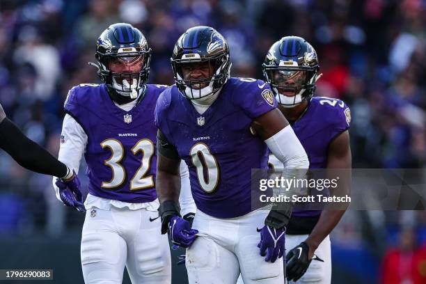 Roquan Smith of the Baltimore Ravens celebrates with Patrick Queen, Marcus Williams, and Brandon Stephens after a play against the Cleveland Browns...