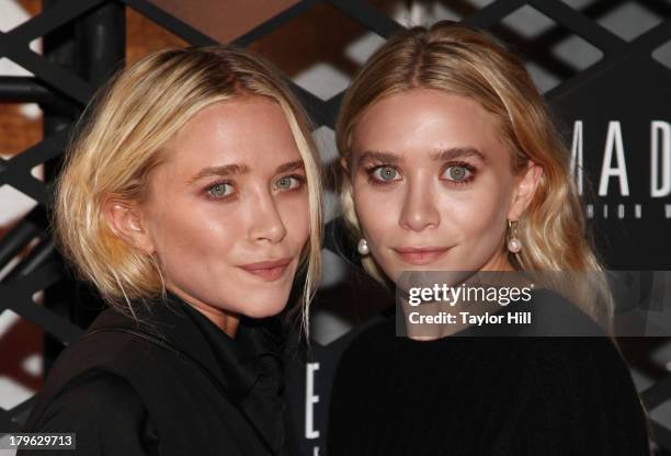Mary-Kate Olsen and Ashley Olsen attend the Lexus Design Disrupted Fashion Event at SIR Stage 37 on September 5, 2013 in New York City.