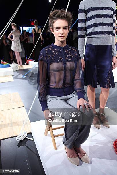 Models pose at the Candela presentation during Spring 2014 Mercedes-Benz Fashion Week at The Box at Lincoln Center on September 5, 2013 in New York...