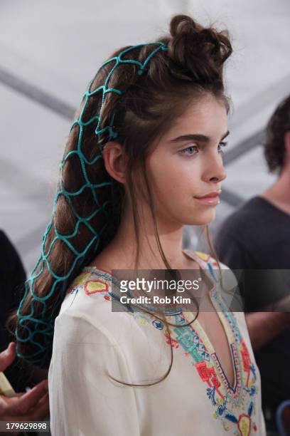 Models backstage at hair and makeup at the Candela presentation during Spring 2014 Mercedes-Benz Fashion Week at The Box at Lincoln Center on...