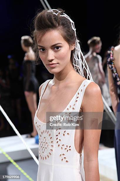 Models pose at the Candela presentation during Spring 2014 Mercedes-Benz Fashion Week at The Box at Lincoln Center on September 5, 2013 in New York...