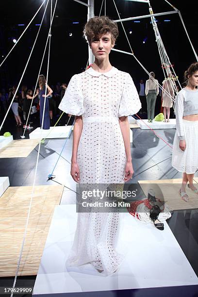 Models pose at the Candela presentation during Spring 2014 Mercedes-Benz Fashion Week at The Box at Lincoln Center on September 5, 2013 in New York...