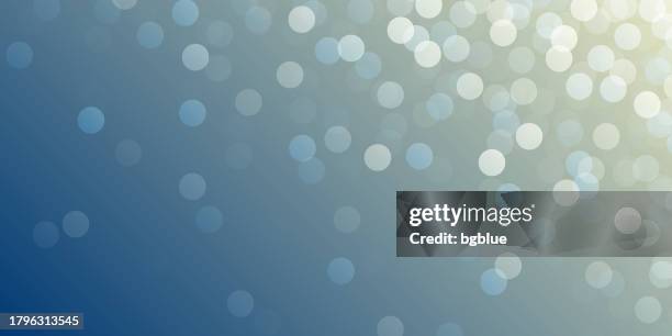 defocused lights on blue background - trendy bokeh background - neutral holiday background stock illustrations