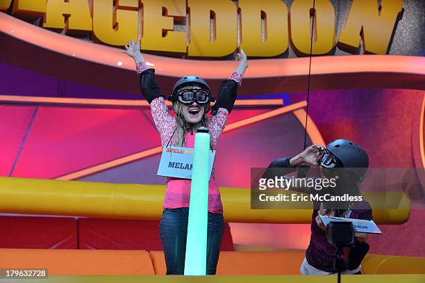 Walt Disney Television via Getty Images Family's game show, "Spell-Mageddon," has contestants take on hilarious distractions while spelling...