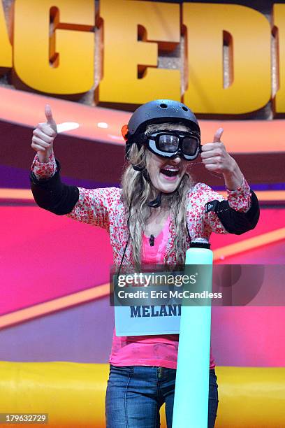 Walt Disney Television via Getty Images Family's game show, "Spell-Mageddon," has contestants take on hilarious distractions while spelling...