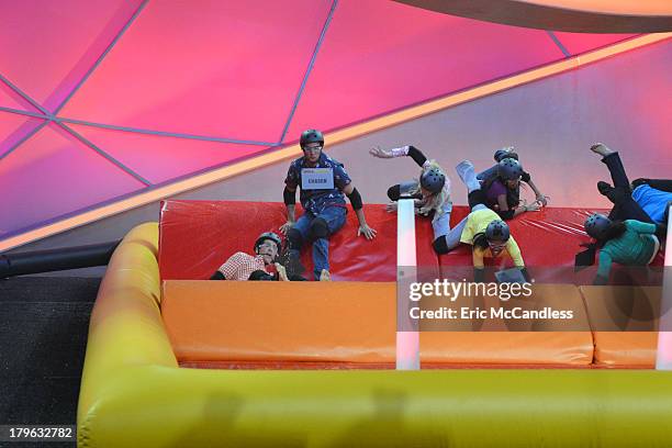 Walt Disney Television via Getty Images Family's game show, "Spell-Mageddon," has contestants take on hilarious distractions while spelling...