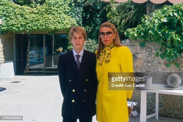 Prince Emmanuele Filiberto of Savoy and his Mother Princess Marina of Savoy pose in front of their House on June 15, 1988 in in Vesenaz, Switzerland.