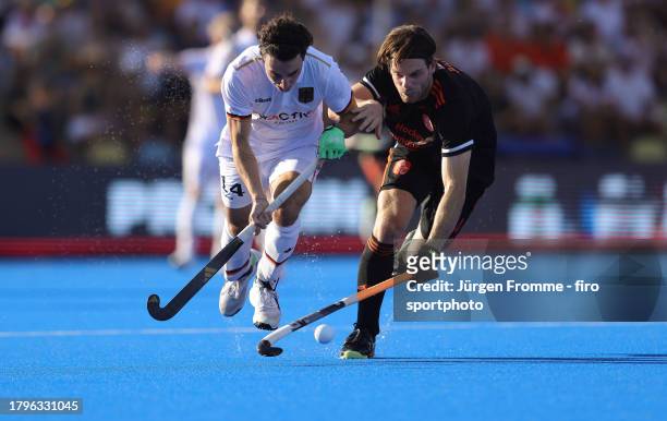 Moenchengladbach, GERMANY Teo Hinrichs of Germany and Lars Balk of Netherlands battle for the ball during the Euro Hockey match Germany against...