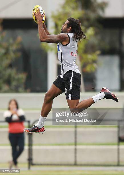Harry O'Brien marks the ball during a Collingwood Magpies AFL training session at Olympic Park on September 6, 2013 in Melbourne, Australia.