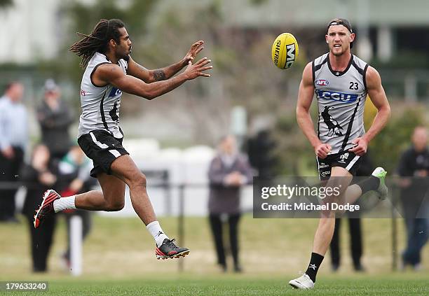 Harry O'Brien marks the ball during a Collingwood Magpies AFL training session at Olympic Park on September 6, 2013 in Melbourne, Australia.